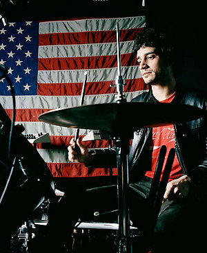Fab of the The Strokes playing the drums. Rock / indie band in NYC 10/2004 NME.