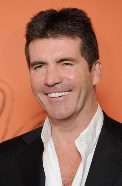 Cowell keen to promote politics factor