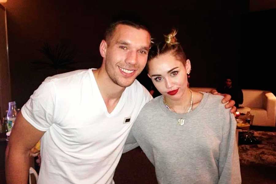 Lukas Podolski and Miley Cyrus