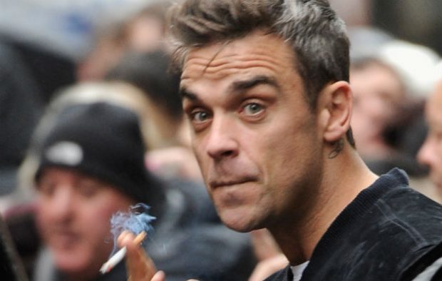 Robbie Williams says he smoked a spliff at Buckingham Palace