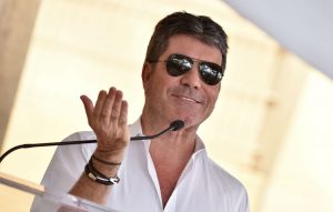 Simon Cowell misses 'The X Factor' live show after 'falling down the stairs'