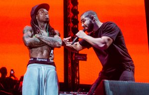 Drake has got a massive tattoo of Lil Wayne on his arm