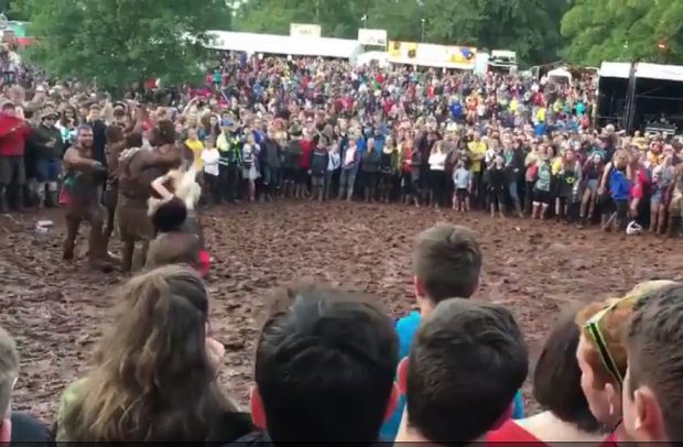 A woman was brutally rugby-tackled into the mud at Kendal Calling