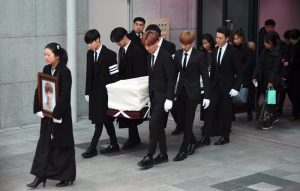 K-pop stars carry Jonghyun's coffin at funeral