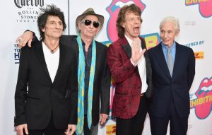 Rolling Stones want anti-parking bollards removed outside a restaurant so they can attend a party