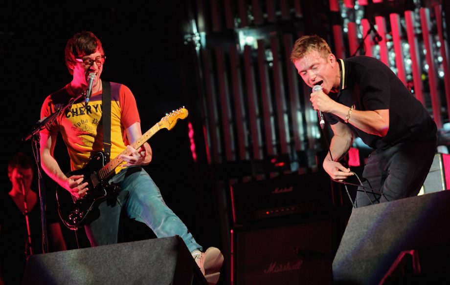 Graham Coxon and Damon Albarn on stage with Blur