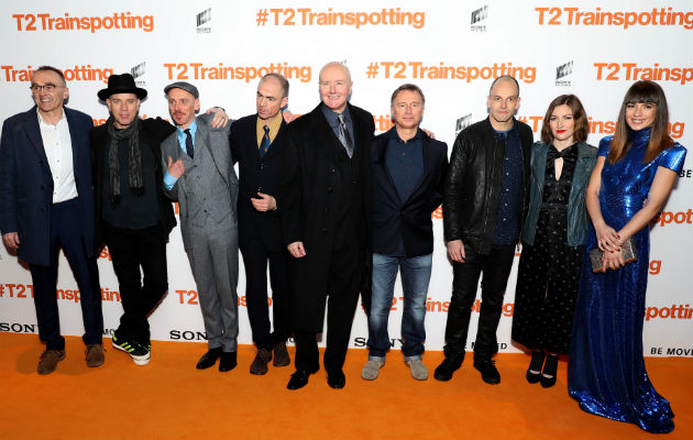 The T2 cast and crew pose for photos