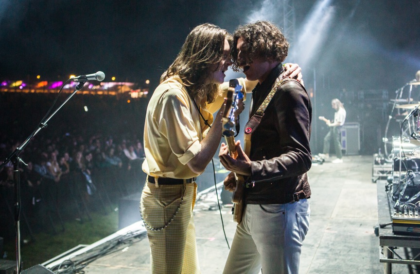 Blossoms frontman Tom Ogden shares a tender moment with guitarist Tom Ogden