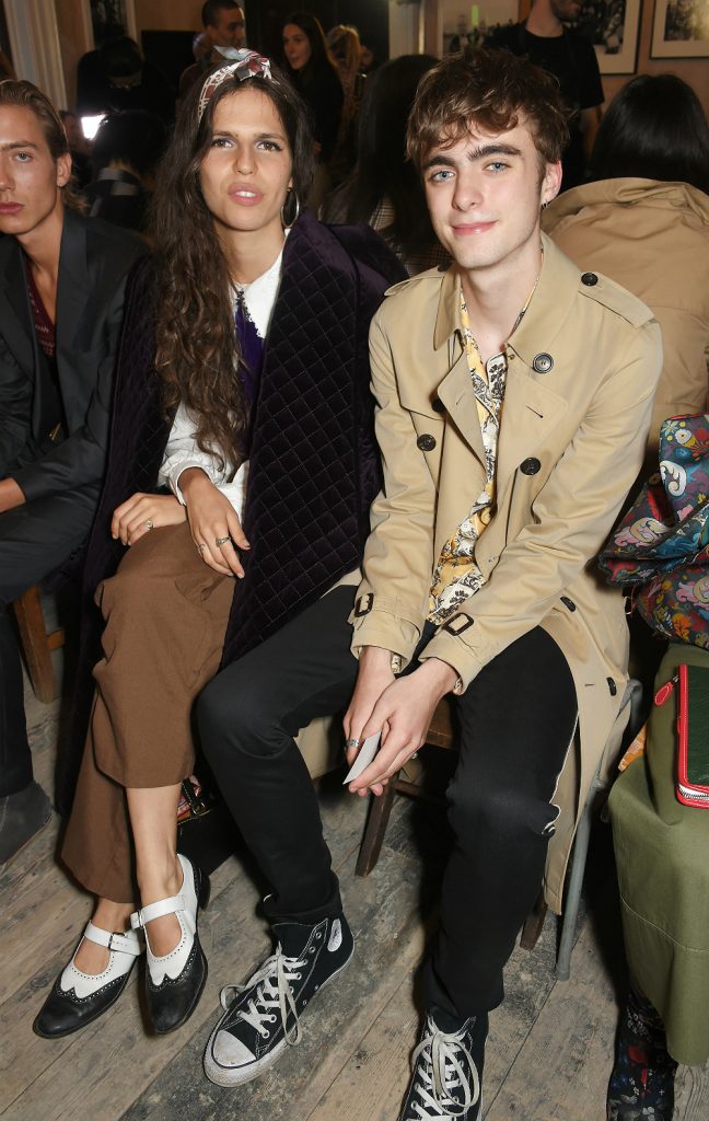 Hayett McCarthy (L) and Lennon Gallagher wearing Burberry at the Burberry September 2017 at London Fashion Week at The Old Sessions House on September 16, 2017 in London, England