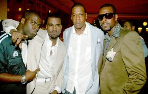 Rhymefest, Kanye West, Jay-Z and Chris Tucker, pictured in 2005