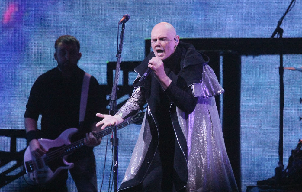 Billy Corgan of The Smashing Pumpkins performs during the opening night of their 'Shiny And Oh So Bright' world tour at Gila River Arena on July 12, 2018 in Glendale, Arizona