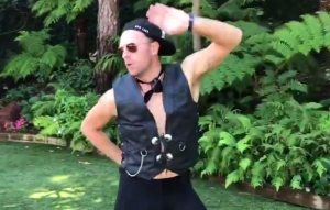 Here's Chris Martin doing a bizarre dance to mark Take That's 30th anniversary