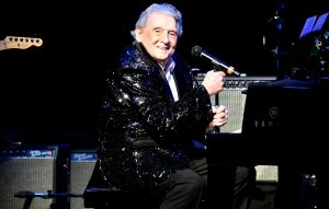 Jerry Lee Lewis has been hospitalised after suffering a minor stroke