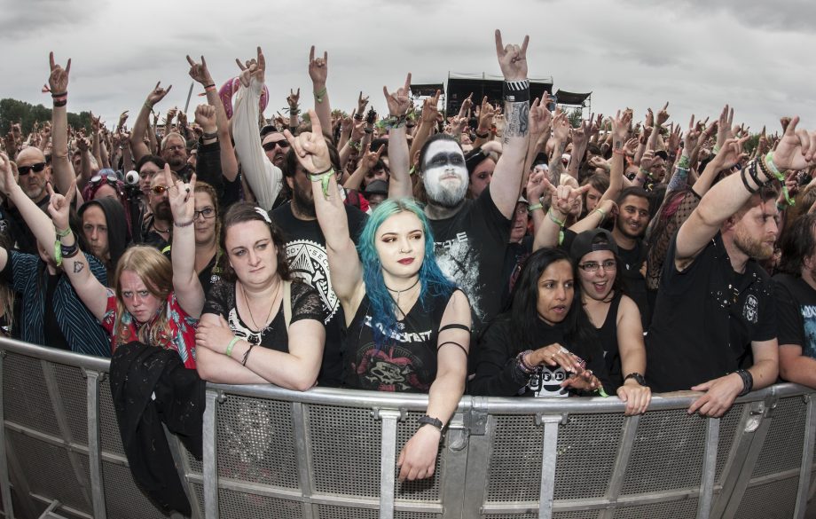 BURTON UPON TRENT, ENGLAND - AUGUST 11: Heavy metal fans at Bloodstock Festival at Catton Hall on August 11, 2018 in Burton Upon Trent, England. (Photo by Katja Ogrin/Redferns)