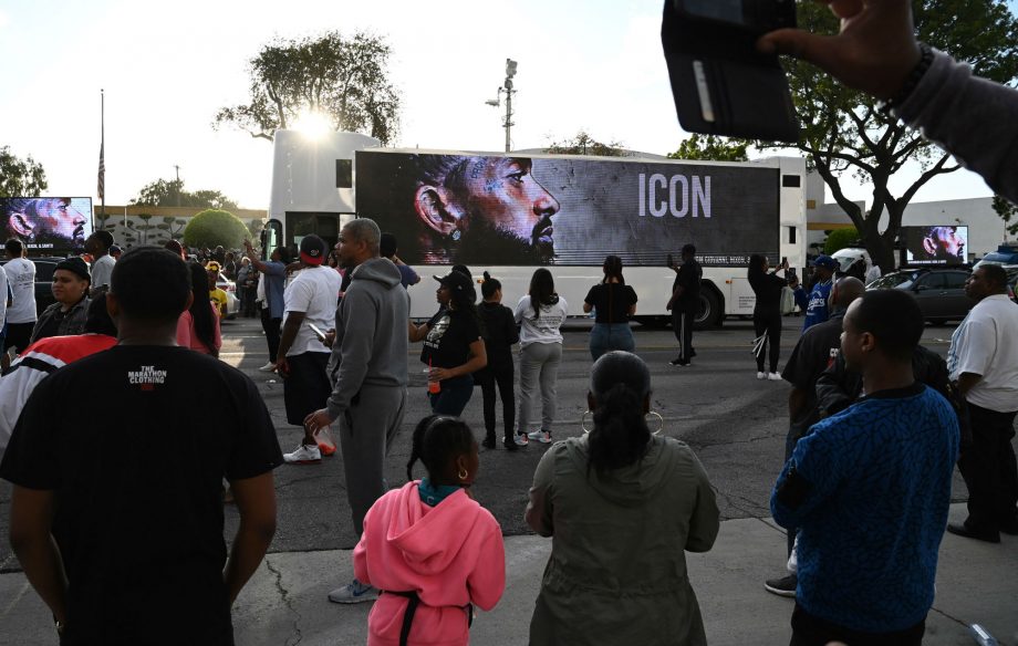 Mourners line the route of Nipsey Hussle's funeral procession