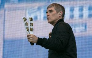 Ian Brown visits creepy fortune-telling machine featured in 'From Chaos To Harmony' video