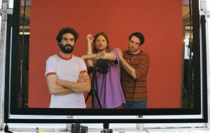 Premiere: Dinosaur Pile-Up rock out in a cop car and explore fame during playful 'Back Foot' video