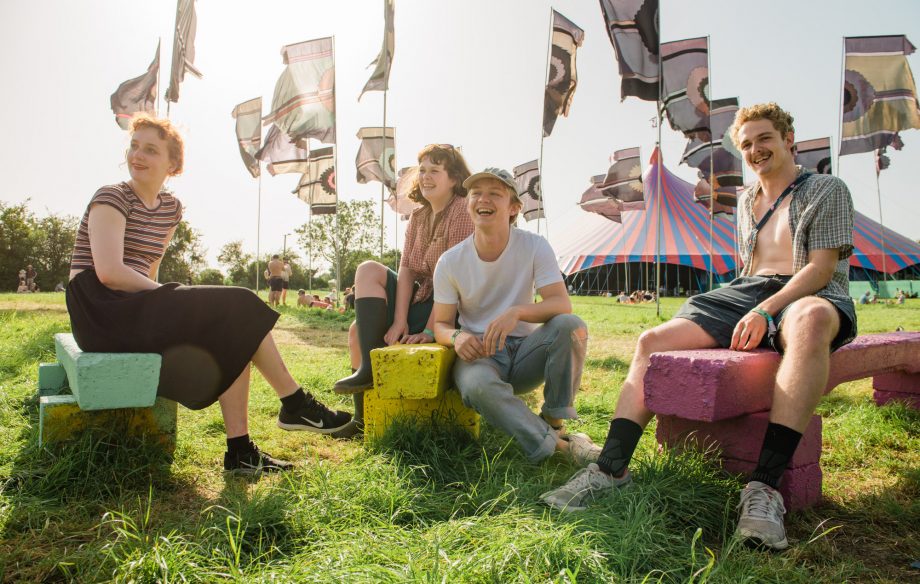 Pip Blom relax at Glastonbury festival