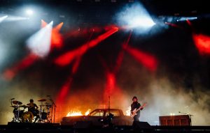Burning cars! Backflips! Crowd surfing drummers! Twenty One Pilots pull out all the stops for huge Reading Festival show