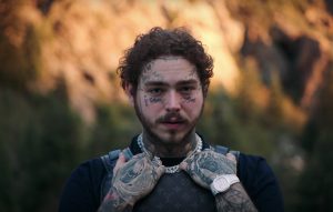 Post Malone stunts in the hills in his 'Saint-Tropez' video