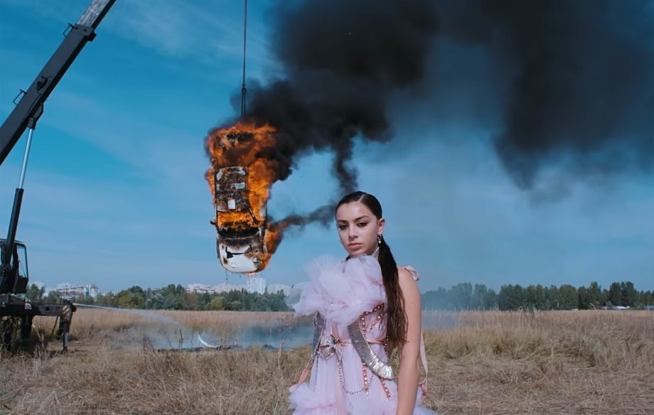 Charli XCX responds to air pollution clams in White Mercedes MV