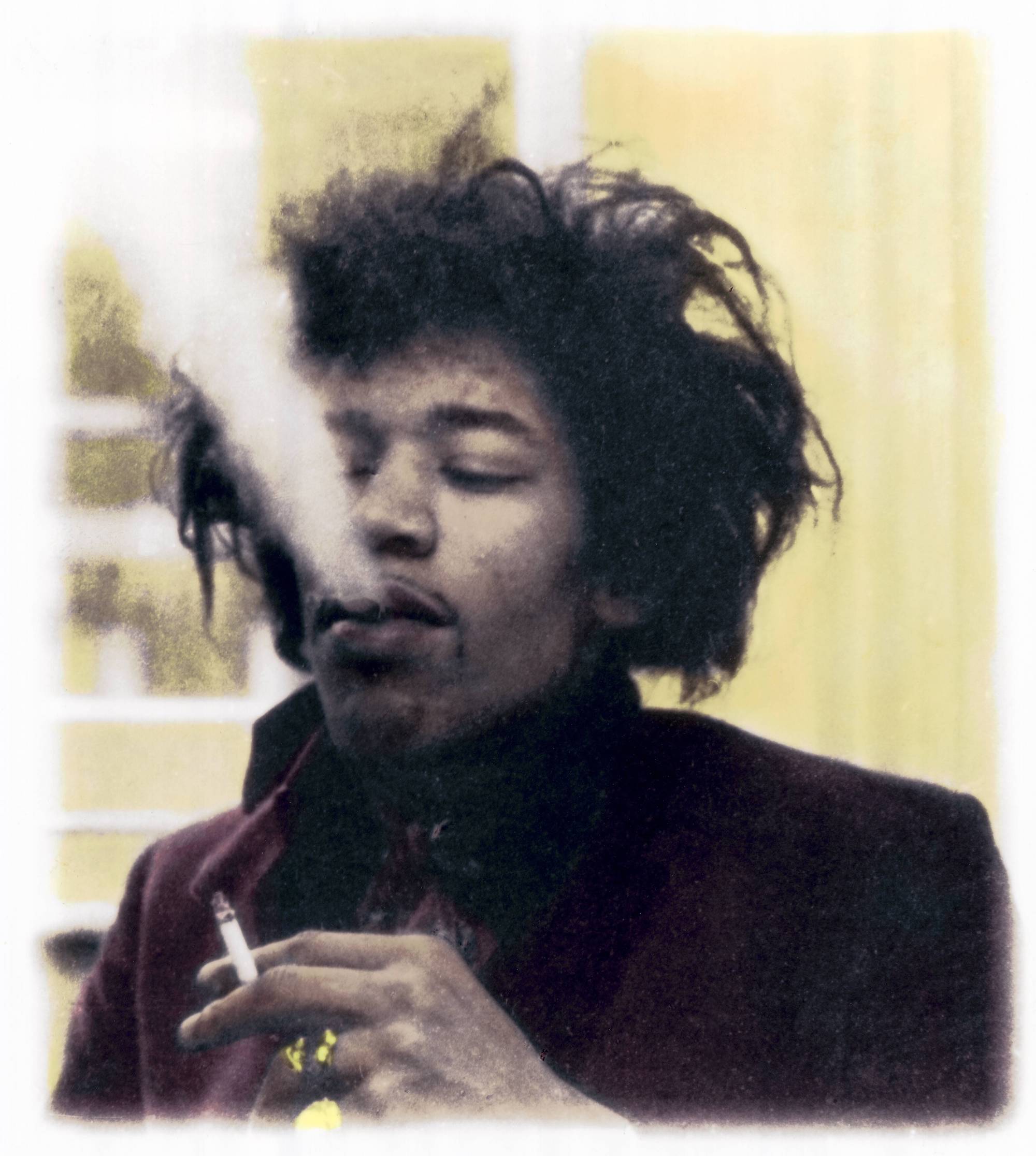 Photo of Jimi HENDRIX; posed, smoking cigarette
